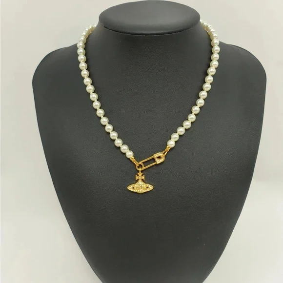 Vivienne Westwood Pearl Necklace with Gold Brooch Pendant
